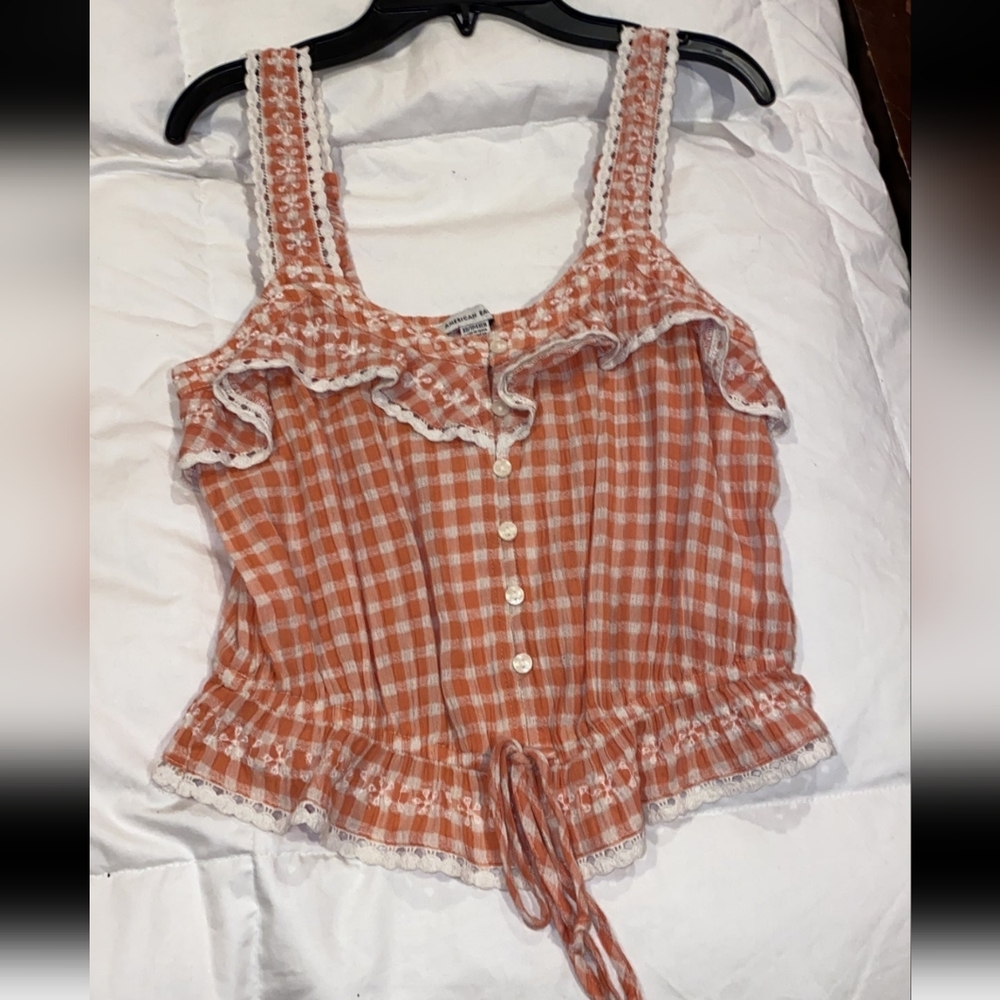 NOT SELLING looking for this AMERICAN EAGLE TOP IN A SIZE MEDIUM ASAP!!!!